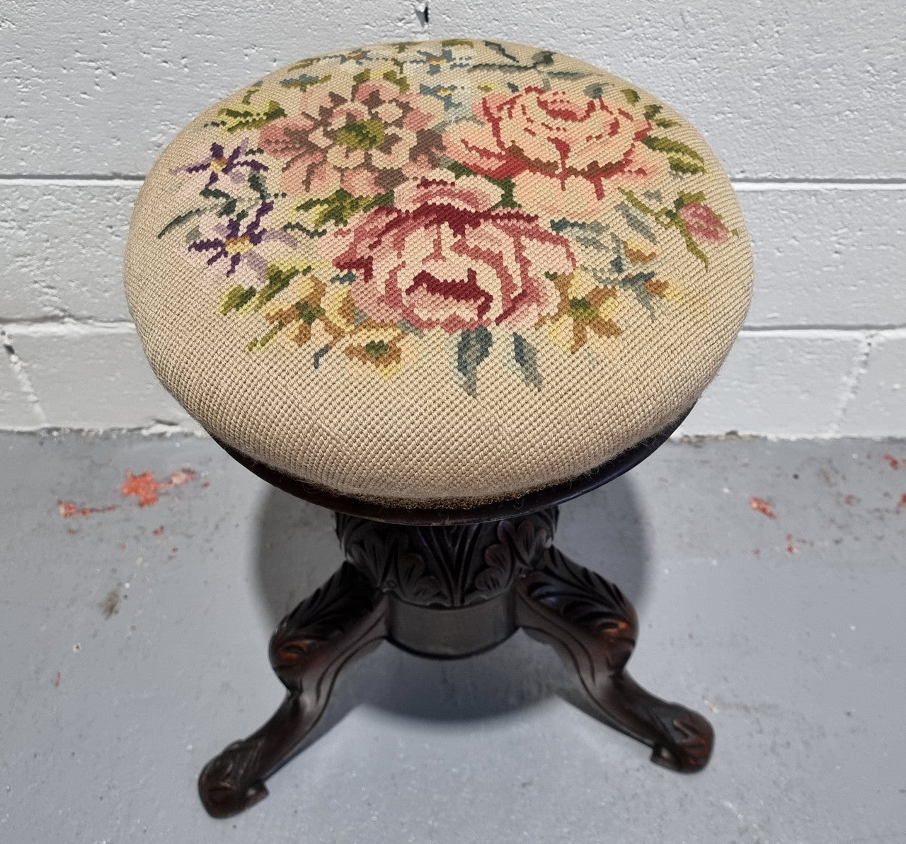 Beautiful Late Victorian Floral tapestry covered revolving piano stool. It is in very good original detailed condition. It has a original David Jones label underneath .