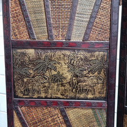 Vintage three panel room divider with elephants made from rattan and wood. It has been sourced locally and is in good original condition.