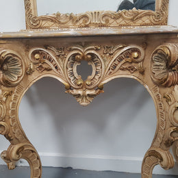 Beautifully carved Italian Rococo style painted console/hall table and mirror. An amazing coloured marble top showing sections of gold veins and is in good condition. Mantle mirror is retaining it's original mirror and showing ages spots.