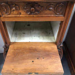 Single French carved bedside with inset marble top. It has beautiful carving and a drawer and cupboard for storage. In very good original detailed condition.