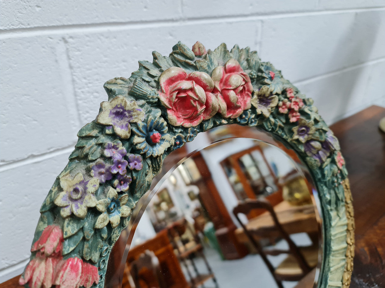 Beautifully decorated Barbola round bevelled edge mirror. In good original condition.