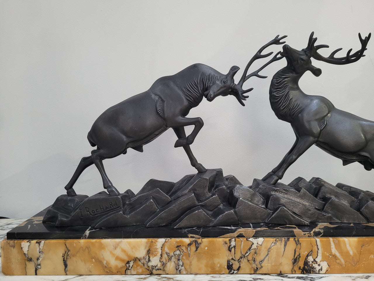 French Art Deco bronzed spelter and marble"Fighting Stags" statue by renowned artist and sculptor "Irenee Rochard".