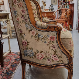 Pair of amazing French Walnut tapestry covered armchairs. The tapestry is in very good condition, please view photos as they form part of the description. Sourced from France and is in good original detailed condition.