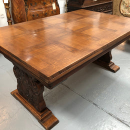 A beautiful French oak, Spanish style parquetry top extension table, with amazing carving and lovely details in very good condition.
