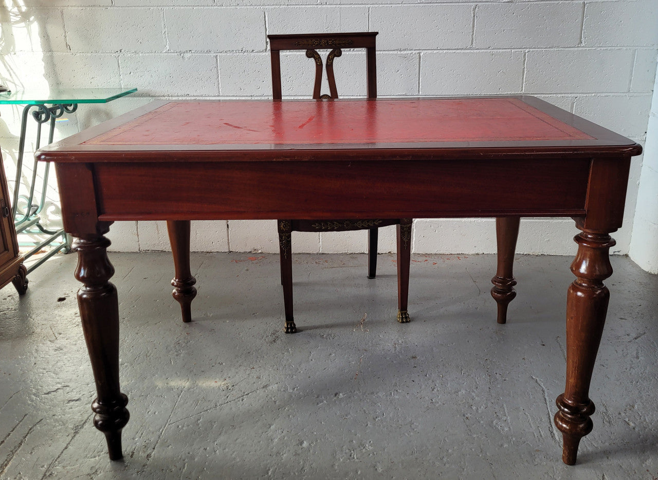 Victorian Cedar two drawer tooled leather topped desk with turned legs. In good original condition.