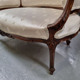 Pretty French Louis XV style small Walnut settee with very good upholstery. Sourced from France and in good original condition, please view photos of the upholstery as it helps form part of the description.