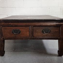 Square Elm coffee table with oriental legs and two long drawers.  Beautifully finished and in good original condition. It has been sourced from France.