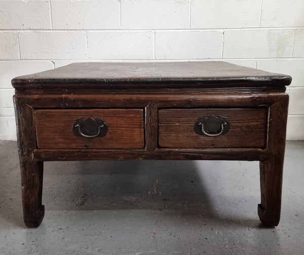 Square Elm coffee table with oriental legs and two long drawers.  Beautifully finished and in good original condition. It has been sourced from France.