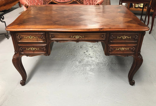 Antique French Walnut and parquetry top Louis XV style partners desk. In good original detailed condition.