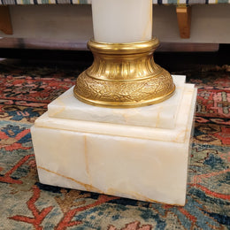 Pair of Imposing French alabaster marble and bronze pedestals. They are highly decorative and have been sourced from France. They are in good original detailed condition.
