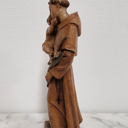 Vintage wood carved St. Anthony and baby Jesus statuette. Hand painted and is in good detailed condition.