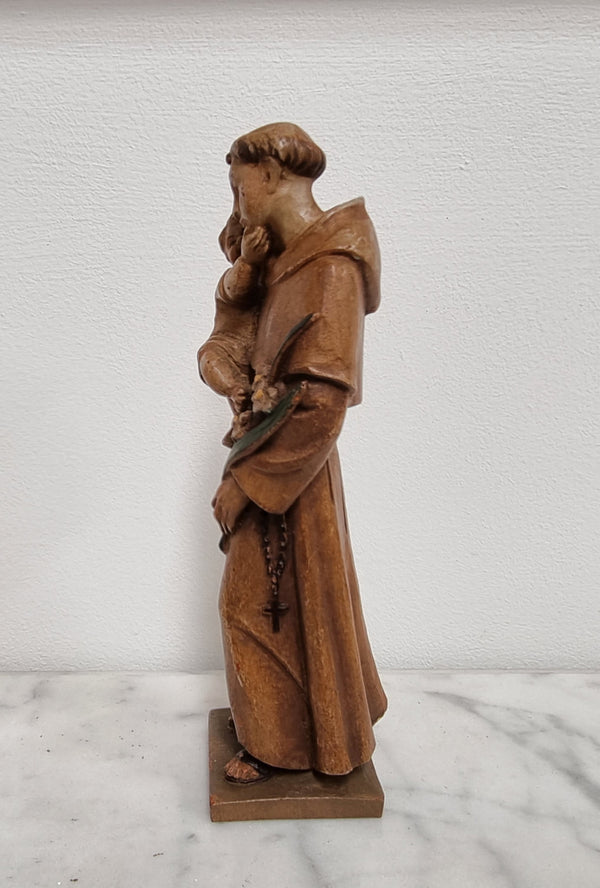 Vintage wood carved St. Anthony and baby Jesus statuette. Hand painted and is in good detailed condition.