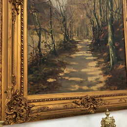 Beautiful Antique French oil on canvas of a path of trees, in a fabulous ornate frame and in good condition.