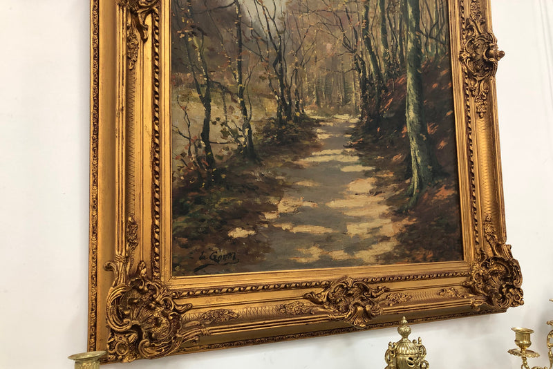 Beautiful Antique French oil on canvas of a path of trees, in a fabulous ornate frame and in good condition.