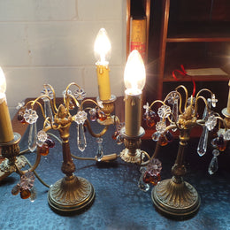 A stunning pair of French Bronze gilt Girandole candelabras, with lovely quartz drops. They are 36 cm tall and have been rewired to Australian standards. They are in very good original condition.