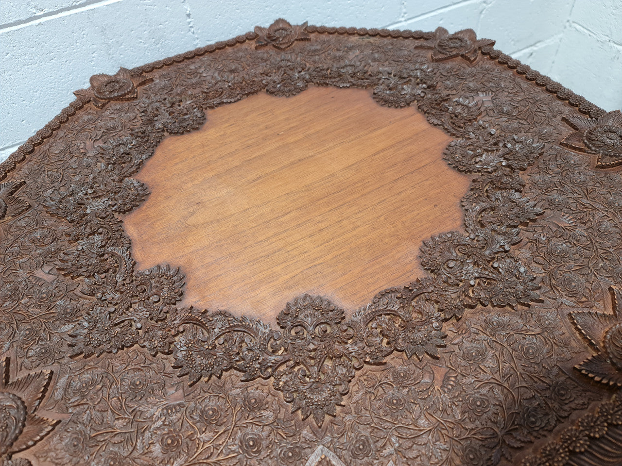 Heavily carved Teakwood round Chinese coffee table. In good original detailed condition. Circa: 1920