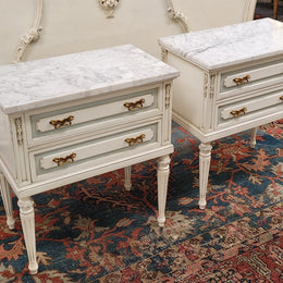 Attractive pair of Vintage French Louis 16th style two drawer marble topped bedsides. They have been sourced from France and are in good original condition.