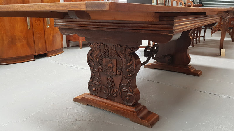 A beautiful French oak, Spanish style parquetry top extension table, with amazing carving and lovely details in very good condition.