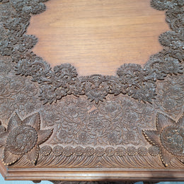 Heavily carved Teakwood round Chinese coffee table. In good original detailed condition. Circa: 1920