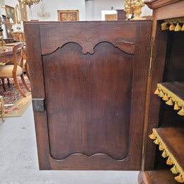 Amazing French Oak early 19th Century two door sideboard with one drawer and two fixed shelves. Sourced from France and in good original detailed condition.