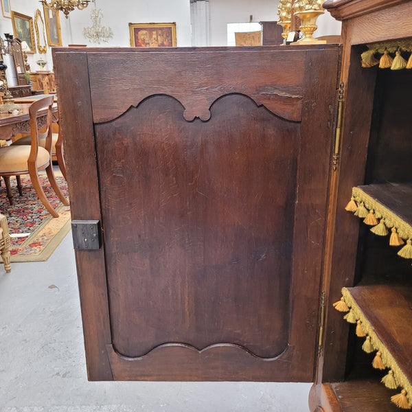 Amazing French Oak early 19th Century two door sideboard with one drawer and two fixed shelves. Sourced from France and in good original detailed condition.