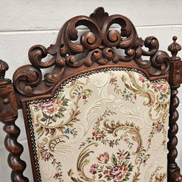 Early 19th Century French renaissance beautifully carved chair with stunning new upholstery. In good original condition with new upholstery.