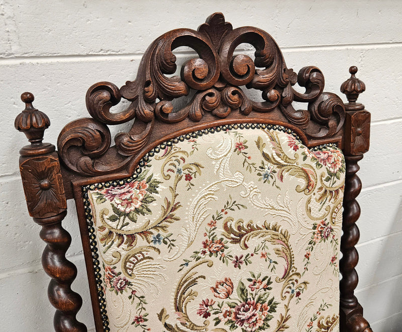 Early 19th Century French renaissance beautifully carved chair with stunning new upholstery. In good original condition with new upholstery.