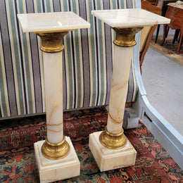 Pair of Imposing French alabaster marble and bronze pedestals. They are highly decorative and have been sourced from France. They are in good original detailed condition.