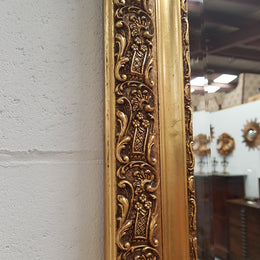A stunning French 19th century gilded wall mirror in good original condition.