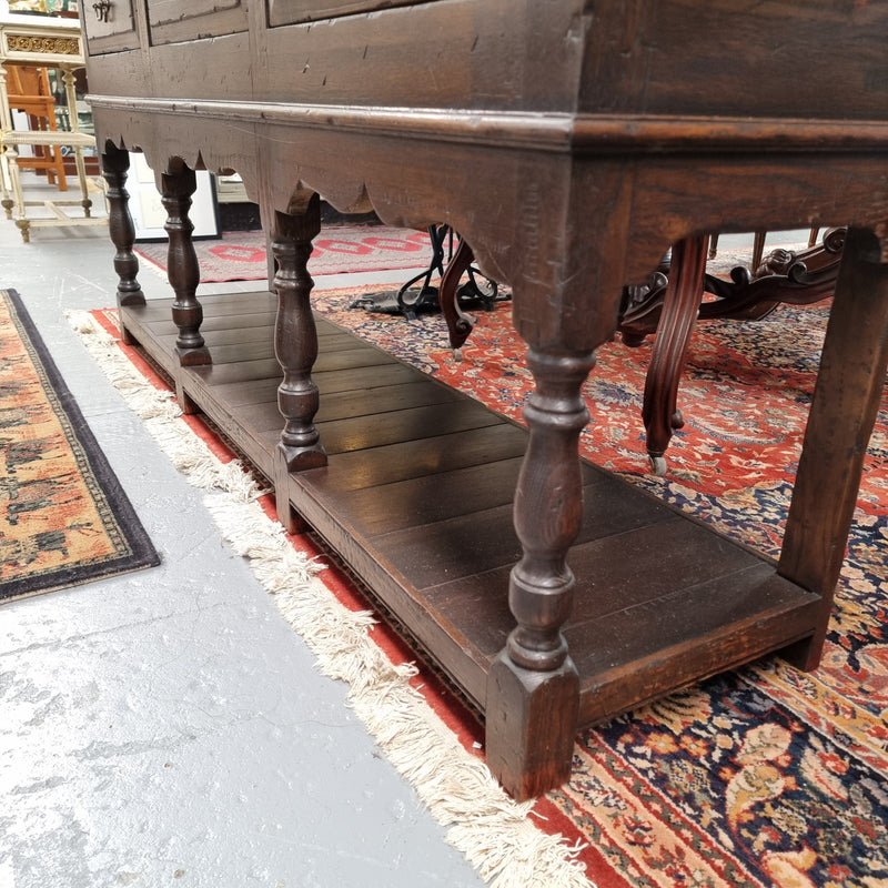 A very hard to find Vintage English kitchen dresser base of narrow proportions, sourced from France. In good original detailed condition.