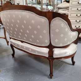 Pretty French Louis XV style small Walnut settee with very good upholstery. Sourced from France and in good original condition, please view photos of the upholstery as it helps form part of the description.