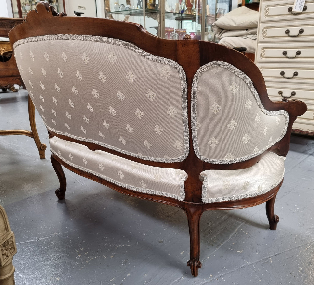 Pretty French Louis XV style small Walnut settee with very good upholstery. Sourced from France and in good original condition, please view photos of the upholstery as it helps form part of the description.