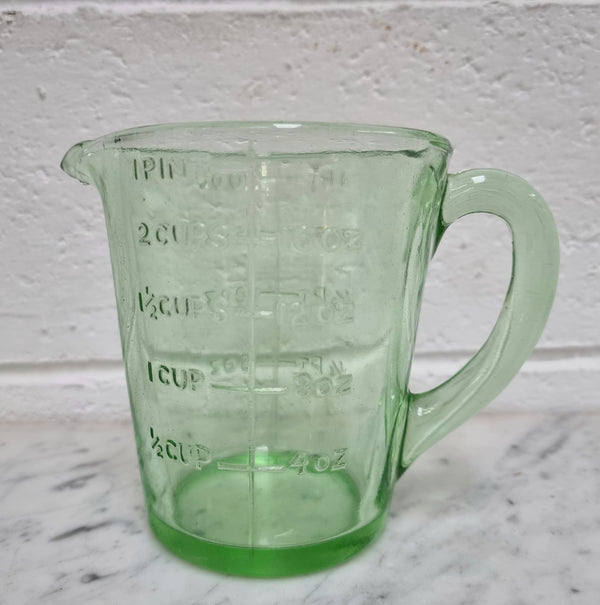 Vintage green depression glass jug. In good original condition.