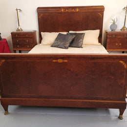 French Art Deco bedroom suite consisting of queen size bed in Amboyna wood and featuring pretty inlay. It comes with a matching pair of bedsides. It is a very stylish and high quality suite. It has been sourced from France and is in good original detailed condition.