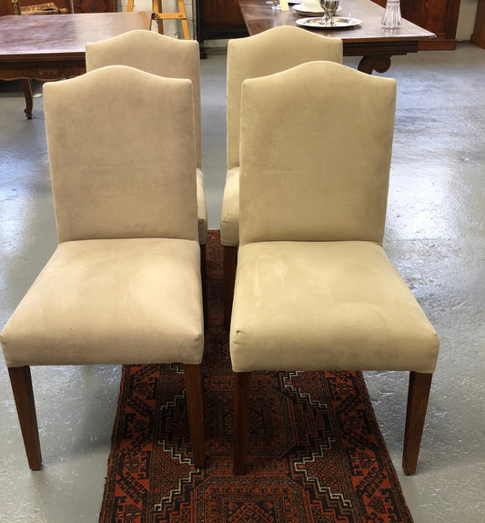 Beautiful set of four upholstered taupe/ light fawn dining chairs which are very comfortable to sit in. They are in good original condition.