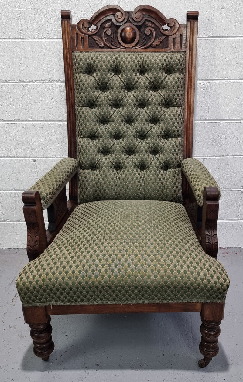 Pair of Edwardian button back Walnut armchairs. They are in good original condition with clean upholstery.