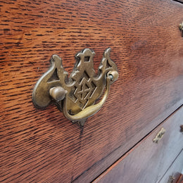 Early 19th Century English Oak chest on stand. It has been sourced in France and has plenty of storage space with eight drawers. In good original detailed condition.