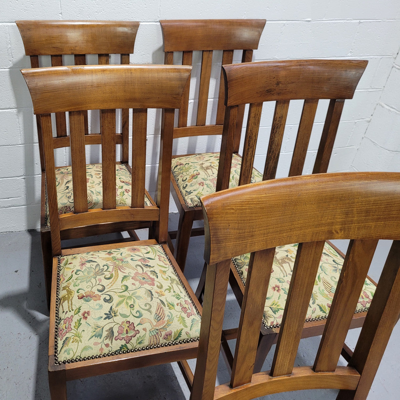 Five Blackwood dining chairs with upholstered seats. They are in good original condition including the upholstery.