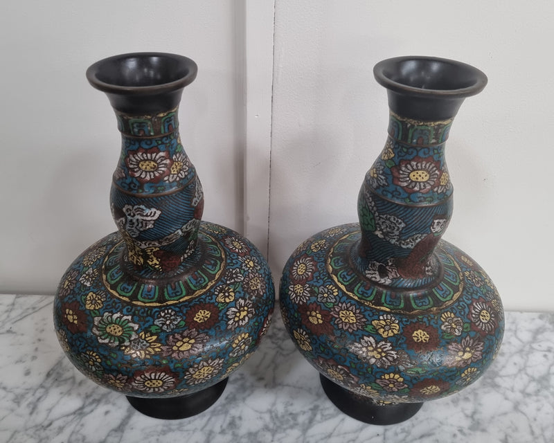 Beautiful pair of Early 19th Century Bronze and Cloisonné vases in good original condition. The base displays the seal marks.