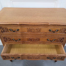 French Oak Louis 15th style nicely carved three drawer wooden top commode. It has been sourced from France and is in good original detailed condition.
