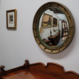 Large round French gilt framed convex mirror. It is a hard to find size with a total diameter of 67 cm. It has been sourced from France and is in good original condition.