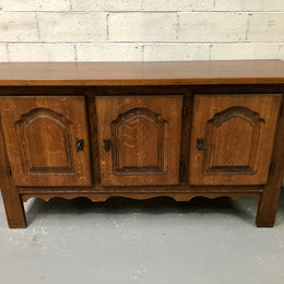 Solid and rustic French oak three door cabinet with plenty of room for storage and all doors lock with heavy duty iron keys.