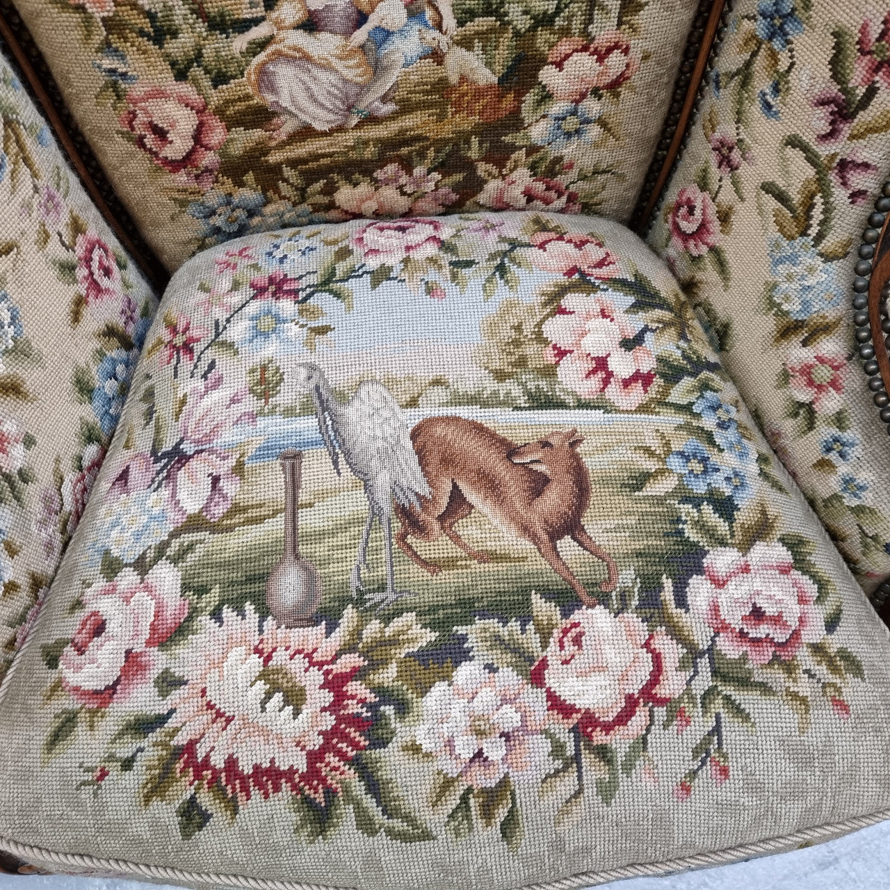 Pair of amazing French Walnut tapestry covered armchairs. The tapestry is in very good condition, please view photos as they form part of the description. Sourced from France and is in good original detailed condition.