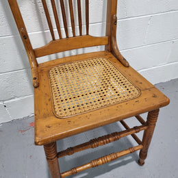 Australian Emu chair with cane inset seat. In good original condition.
