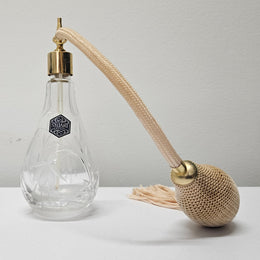 Pretty decorative Fuchsia pattern crystal perfume bottle. Produced by STUART. A bulb shape with atomiser in good working condition.
