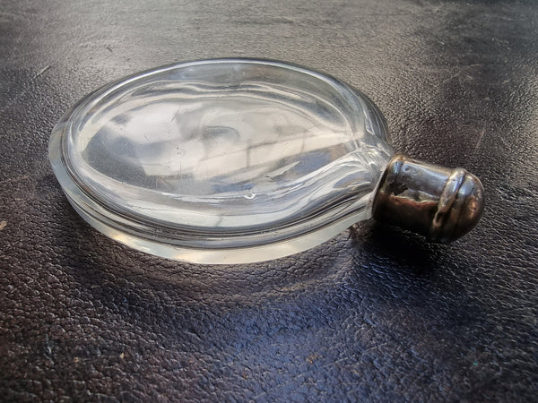 Simple but beautiful Antique silver and cut crystal perfume bottle . It also so has a lovely small internal stopper see photos. It is in good original condition.