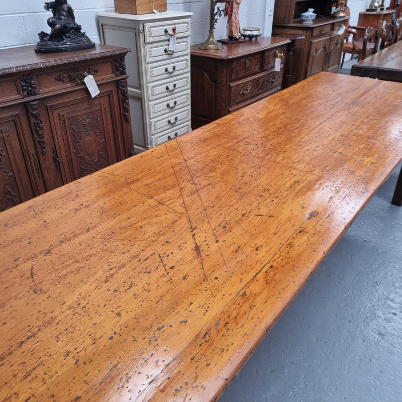 Extremely rare one piece top Kauri Pine Australian farmhouse table. It is truly an amazing table with loads of character, it comfortably seats 14 to 16 people. In good original detailed condition and sourced locally.