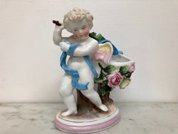 Victorian Ceramic Figure Of Cupid Carrying A Basket | Antique & Vintage | Moonee Ponds Antiques | Australia Wide Delivery