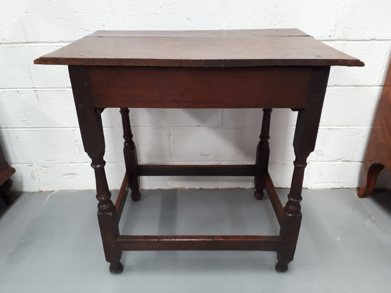 A late 18th century French oak side table with drawer with exceptional patina and is in good condition. Circa 1800.