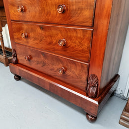 A 19th Century Scottish Flame Mahogany tall boy/ Chest of six drawers. Beautiful carvings and easily comes apart into three sections making transport o0r moving into place easy. In good original detailed condition.